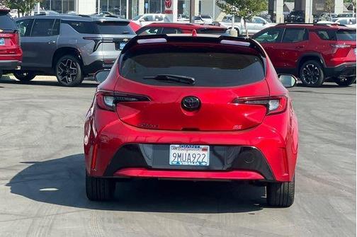 Red 2024 Toyota Corolla Hatchback SE