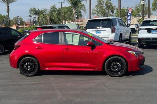 Red 2024 Toyota Corolla Hatchback SE