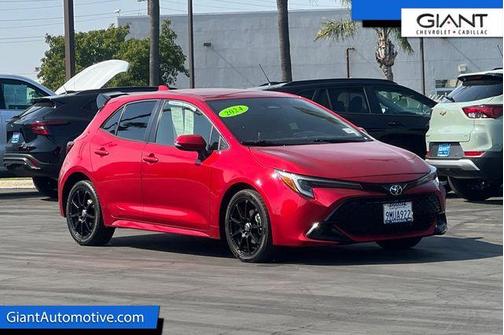 Red 2024 Toyota Corolla Hatchback SE