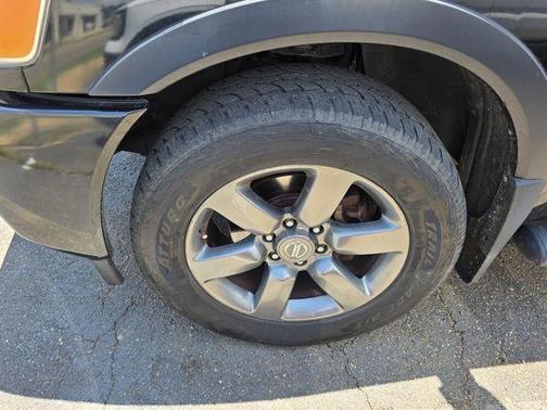 Magnetic Black 2015 Nissan Titan SV