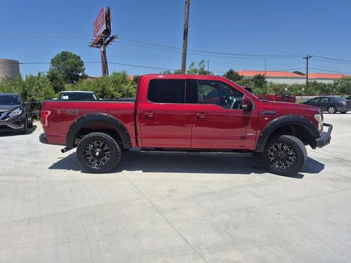 Red 2015 Ford F-150 Lariat