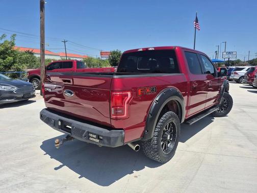 Red 2015 Ford F-150 Lariat
