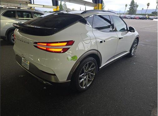 Alta White 2023 Genesis GV60 Advanced AWD