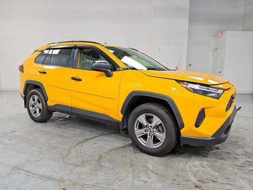 Yellow 2023 Toyota RAV4 Hybrid LE