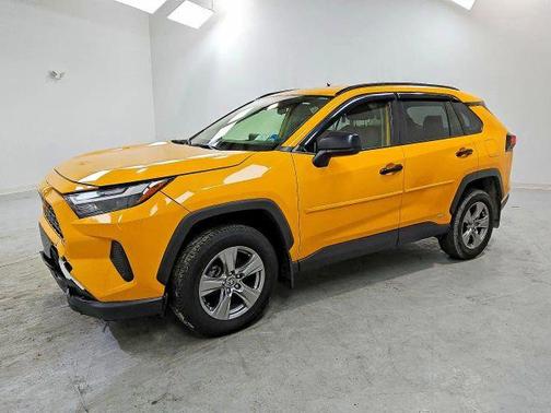 Yellow 2023 Toyota RAV4 Hybrid LE