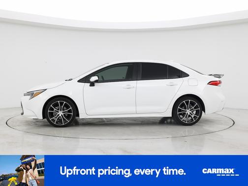 White 2024 Toyota Corolla Hybrid LE