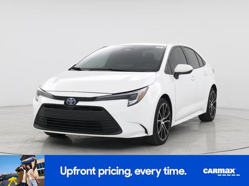 White 2024 Toyota Corolla Hybrid LE