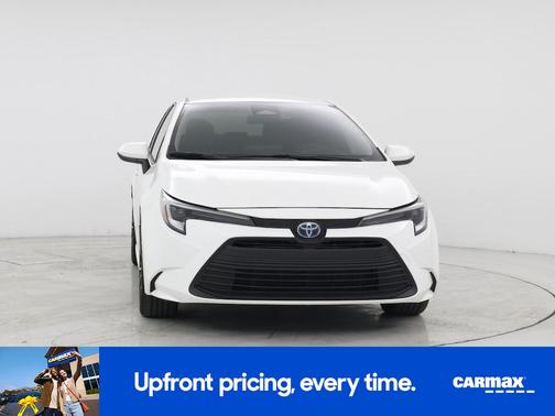 White 2024 Toyota Corolla Hybrid LE