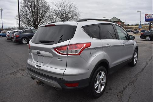 Ruby Red Metallic Tinted Clearcoat 2015 Ford Escape SE