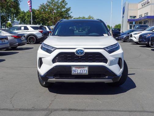Midnight Black Metallic 2023 Toyota RAV4 Hybrid SE