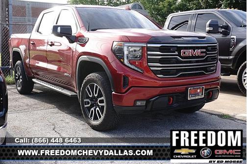 Volcanic Red Tintcoat 2025 GMC Sierra 1500 AT4