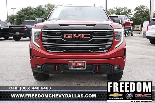 Volcanic Red Tintcoat 2025 GMC Sierra 1500 AT4