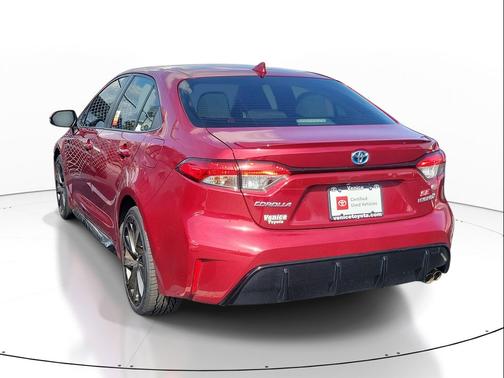 Ruby Flare Pearl 2024 Toyota Corolla Hybrid SE