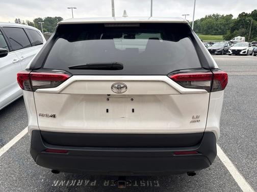 White 2023 Toyota RAV4 LE