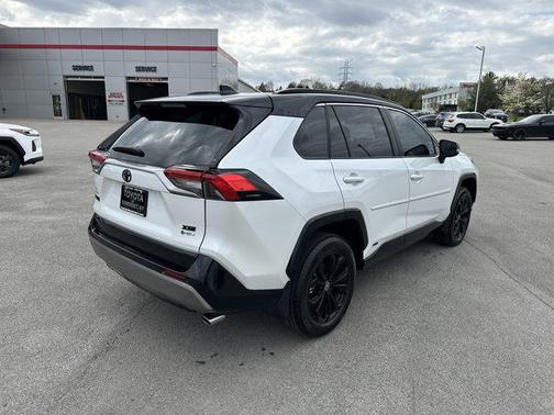Wind Chill Pearl/Midnight Black Metallic 2025 Toyota RAV4 Hybrid SE