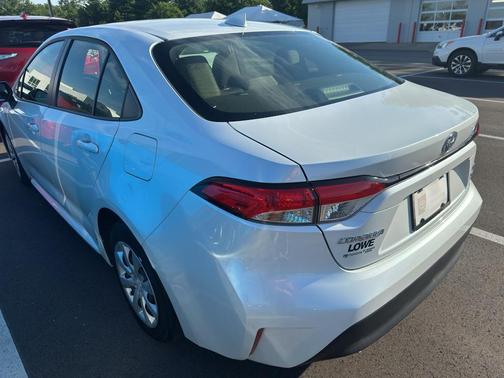 Wind Chill Pearl 2026 Toyota Corolla Hybrid LE