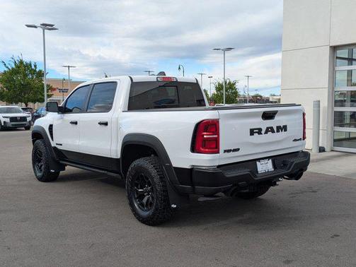 Bright White Clearcoat 2025 RAM 1500 RHO Crew Cab 4x4 5'7' Box
