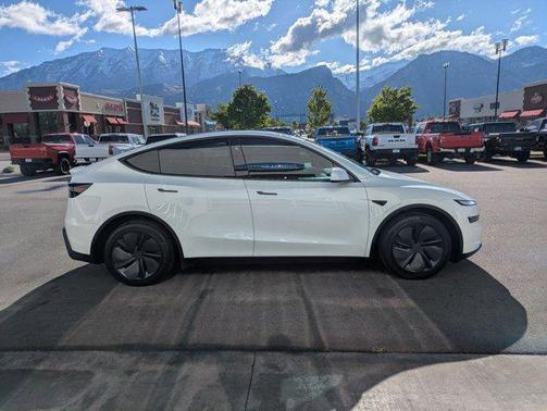 Pearl White Multi-Coat 2026 Tesla Model Y Long Range Launch Series