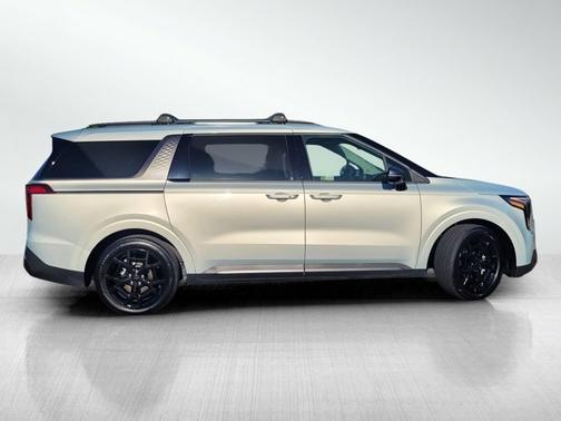 Ivory Silver 2025 Kia Carnival Hybrid SX