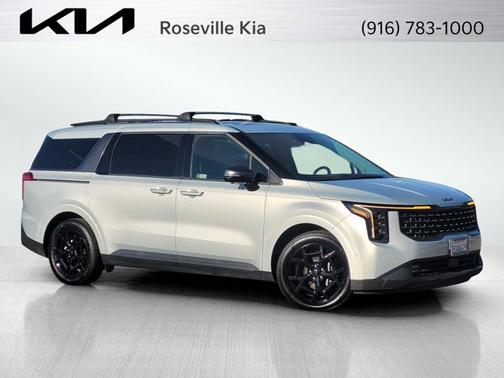 Ivory Silver 2025 Kia Carnival Hybrid SX
