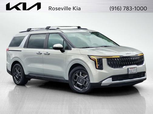 Ivory Silver 2025 Kia Carnival Hybrid EX