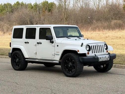 White 2013 Jeep Wrangler Unlimited Sahara