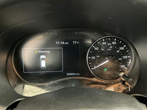 Scarlet Ember Tintcoat/Super Black 2023 Nissan Kicks SR