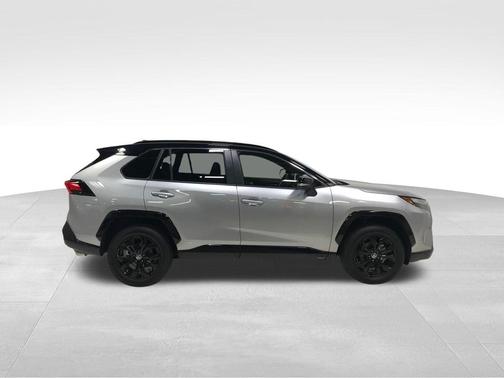 Silver Sky Metallic/Midnight Black Metallic 2023 Toyota RAV4 Hybrid SE