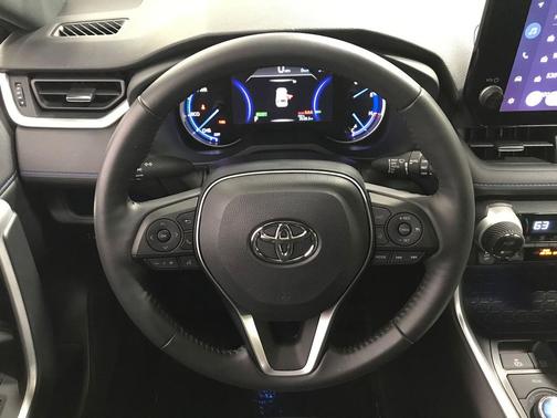 Silver Sky Metallic/Midnight Black Metallic 2023 Toyota RAV4 Hybrid SE