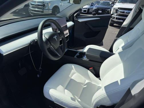 Blue 2023 Tesla Model Y Long Range Sport Utility 4D
