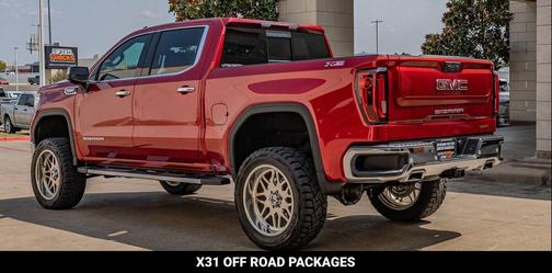 Volcanic Red Tintcoat 2024 GMC Sierra 1500 SLT