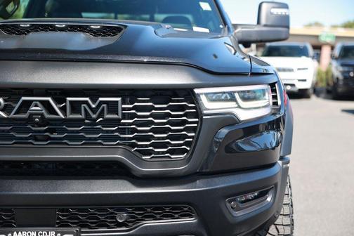 Diamond Black Crystal Pearlcoat 2025 RAM 1500 RHO Crew Cab 4x4 5'7' Box