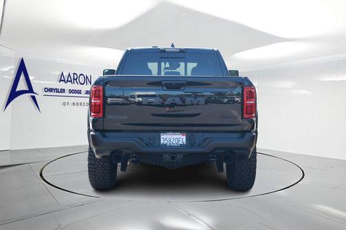 Diamond Black Crystal Pearlcoat 2025 RAM 1500 RHO Crew Cab 4x4 5'7' Box