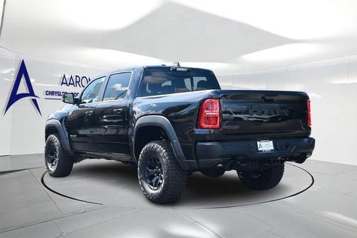 Diamond Black Crystal Pearlcoat 2026 RAM 1500 RHO Crew Cab 4x4 5'7' Box