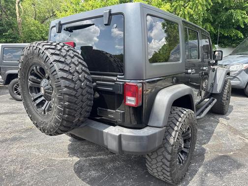 Black Clearcoat 2011 Jeep Wrangler Unlimited Sport