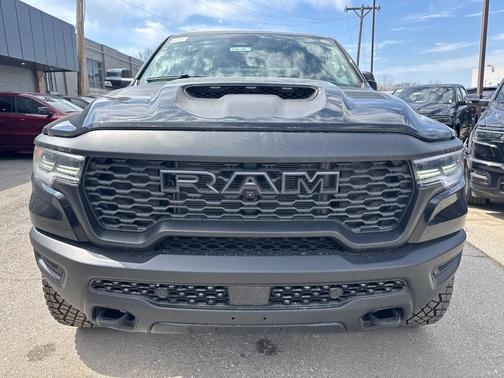 Diamond Black Crystal Pearlcoat 2026 RAM 1500 RHO Crew Cab 4x4 5'7' Box