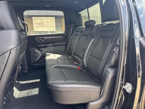 Diamond Black Crystal Pearlcoat 2026 RAM 1500 RHO Crew Cab 4x4 5'7' Box