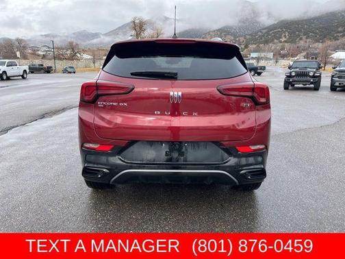 Cinnabar Metallic 2024 Buick Encore GX Sport Touring