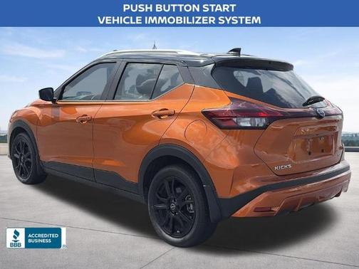 Monarch Orange / Super Black 2024 Nissan Kicks SV