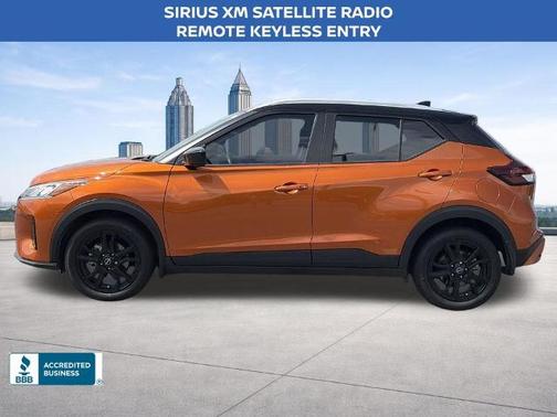 Monarch Orange / Super Black 2024 Nissan Kicks SV