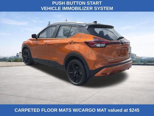 Monarch Orange / Super Black 2024 Nissan Kicks SV