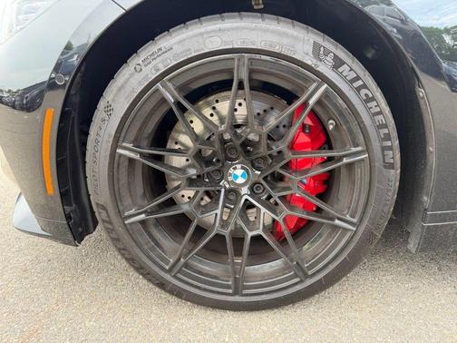 Black Sapphire Metallic 2024 BMW M4 Competition xDrive