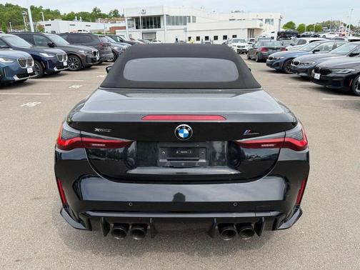 Black Sapphire Metallic 2024 BMW M4 Competition xDrive