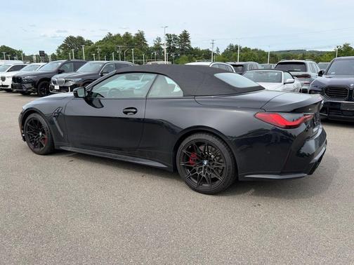 Black Sapphire Metallic 2024 BMW M4 Competition xDrive