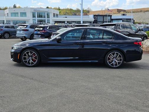 Carbon Black Metallic 2023 BMW M550 i xDrive