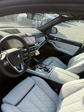 Black Sapphire Metallic 2026 BMW X5 PHEV xDrive50e