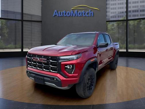 Volcanic Red Tintcoat 2026 GMC Canyon Elevation
