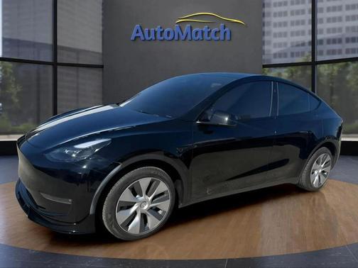 Solid Black 2024 Tesla Model Y Long Range Dual Motor All-Wheel Drive