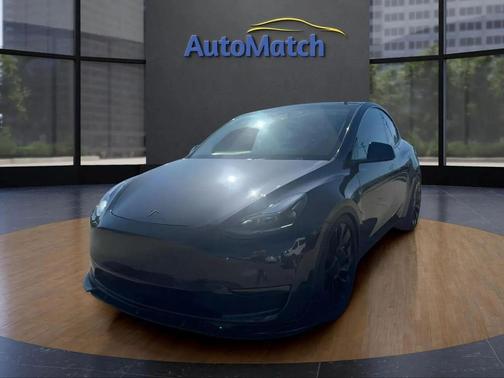 Gray 2025 Tesla Model Y Performance Dual Motor All-Wheel Drive