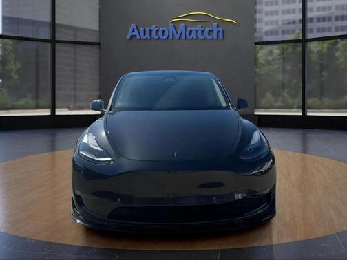 Gray 2025 Tesla Model Y Performance Dual Motor All-Wheel Drive